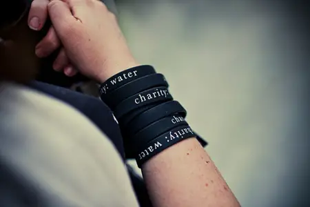 Charity: Water is a great example of a Nonprofit that uses Charity Bracelets effectively! (Photo by Silicone Prairie News / Flickr)